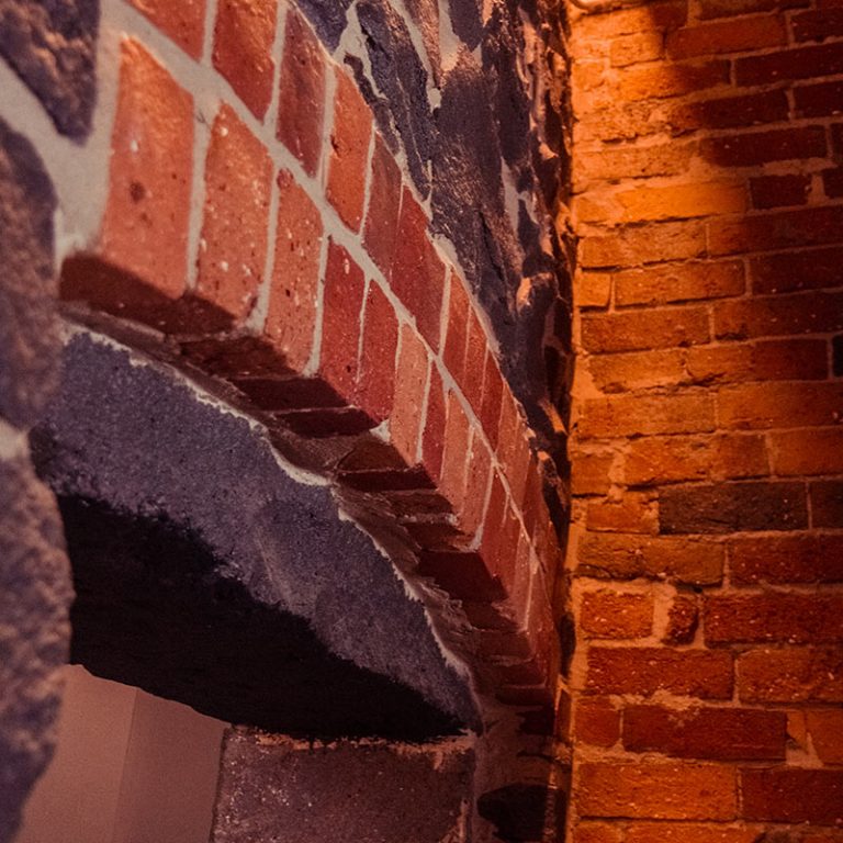 A bluestone and brick detailed wall close up on doorframe detailing